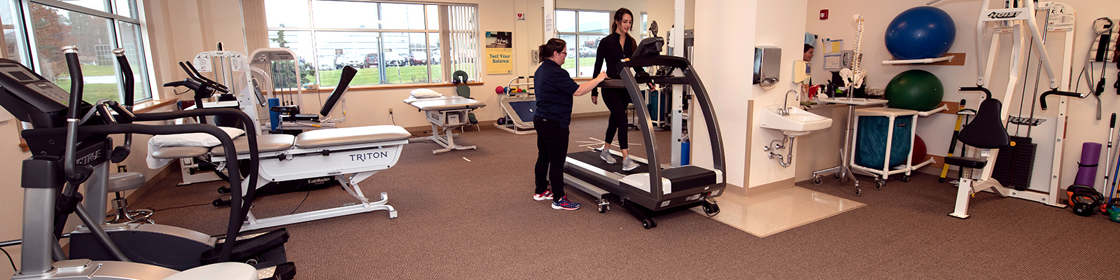 Patient rehabbing in the physical therapy room.